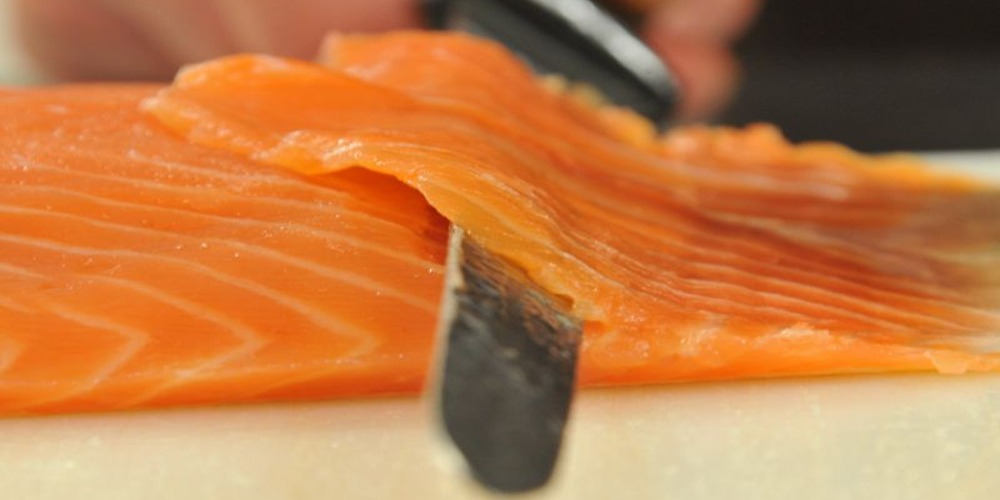 Hand Slicing Salmon